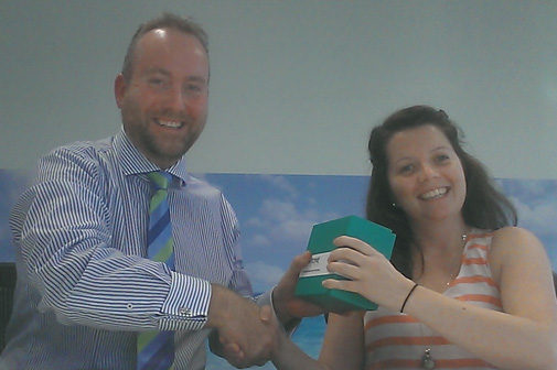 Brett Dashwood presenting Sarah Thorn from nib with the Pantone Colour of the Year mug for comments, questions, and general interactivity